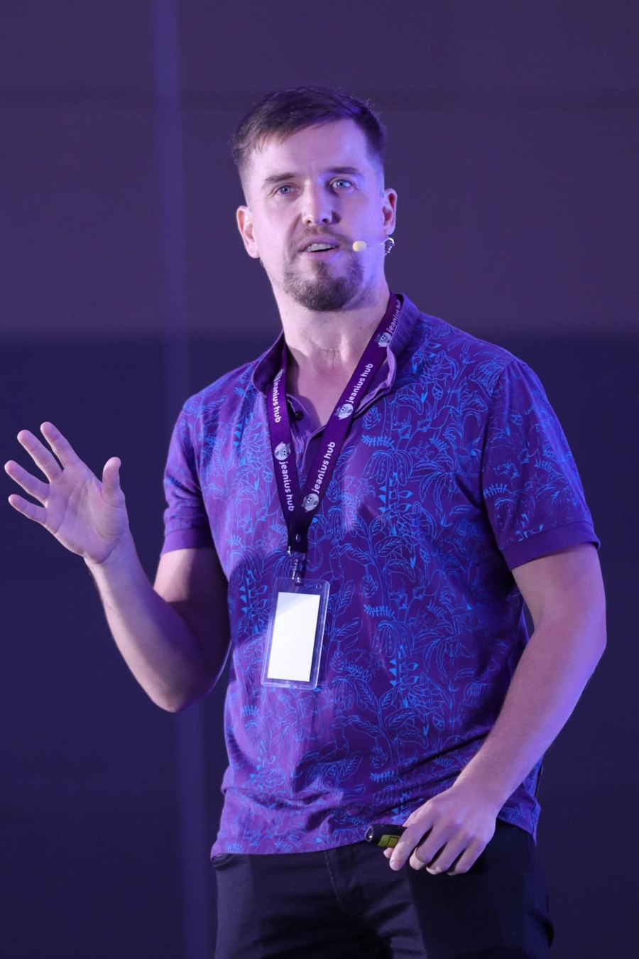 Kevin Meng speaking on stage